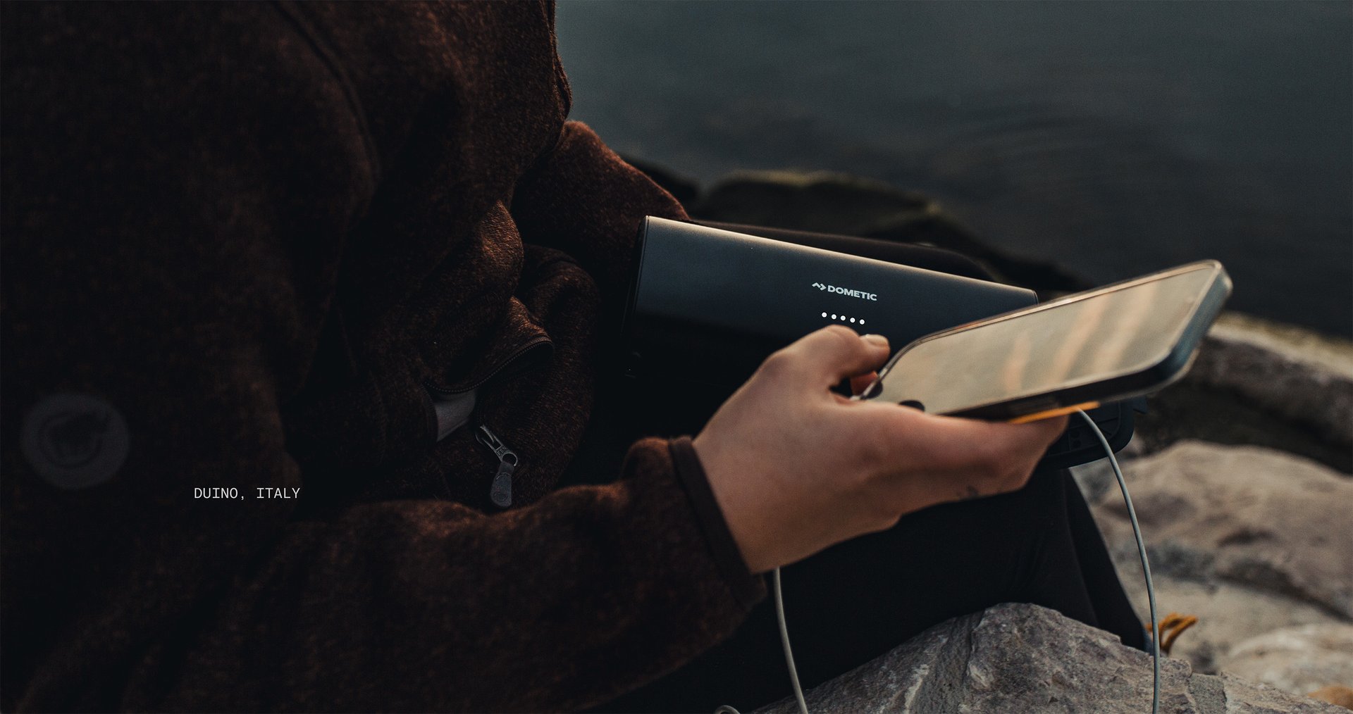 A Dometic PLB15 charging a phone