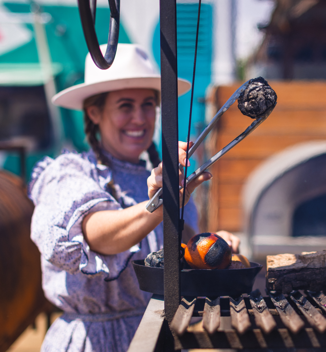 Sarah Glover Cooking Fruit Over Fire