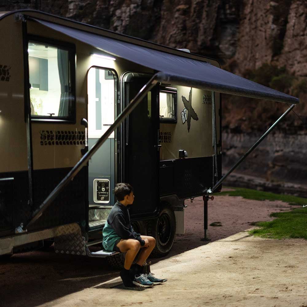 Caravan with awnings