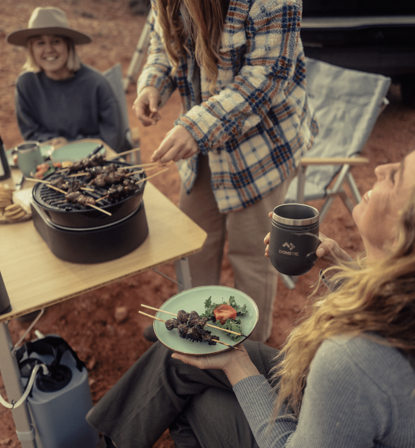 Sarah Glover cooking for friends with Dometic gear