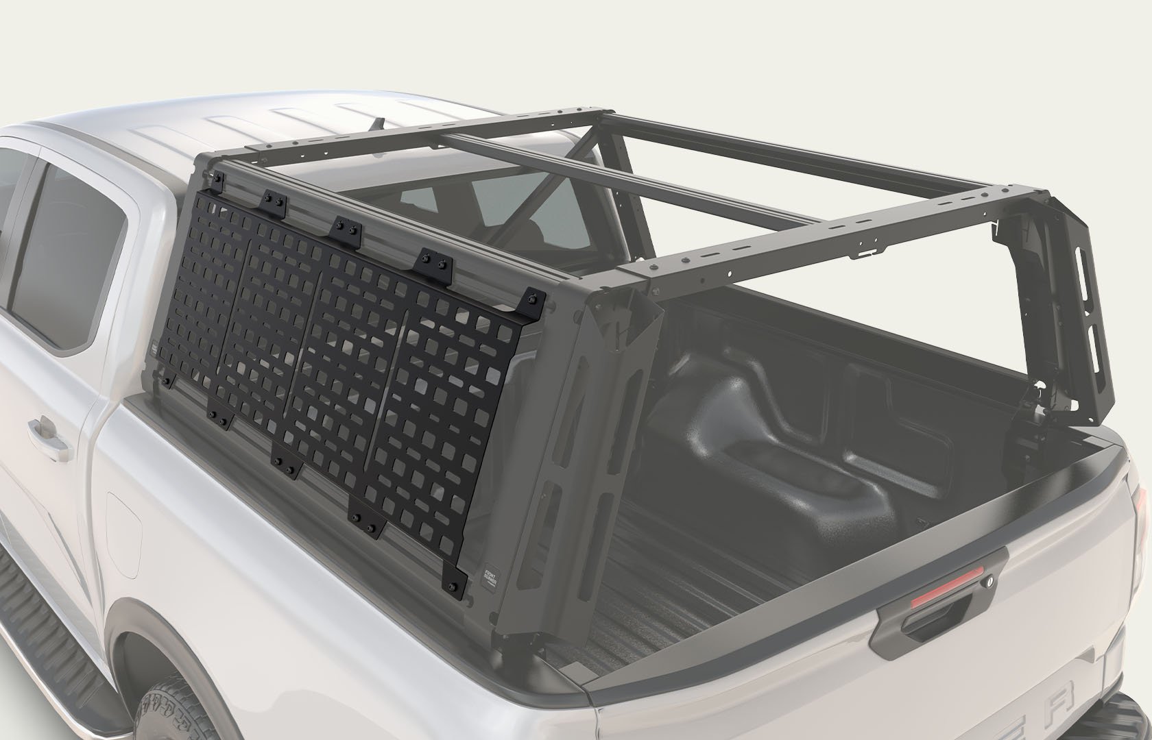 Pro Bed Rack System mounted on a pickup truck with side-mounted accessory panels, providing additional gear mounting and storage options