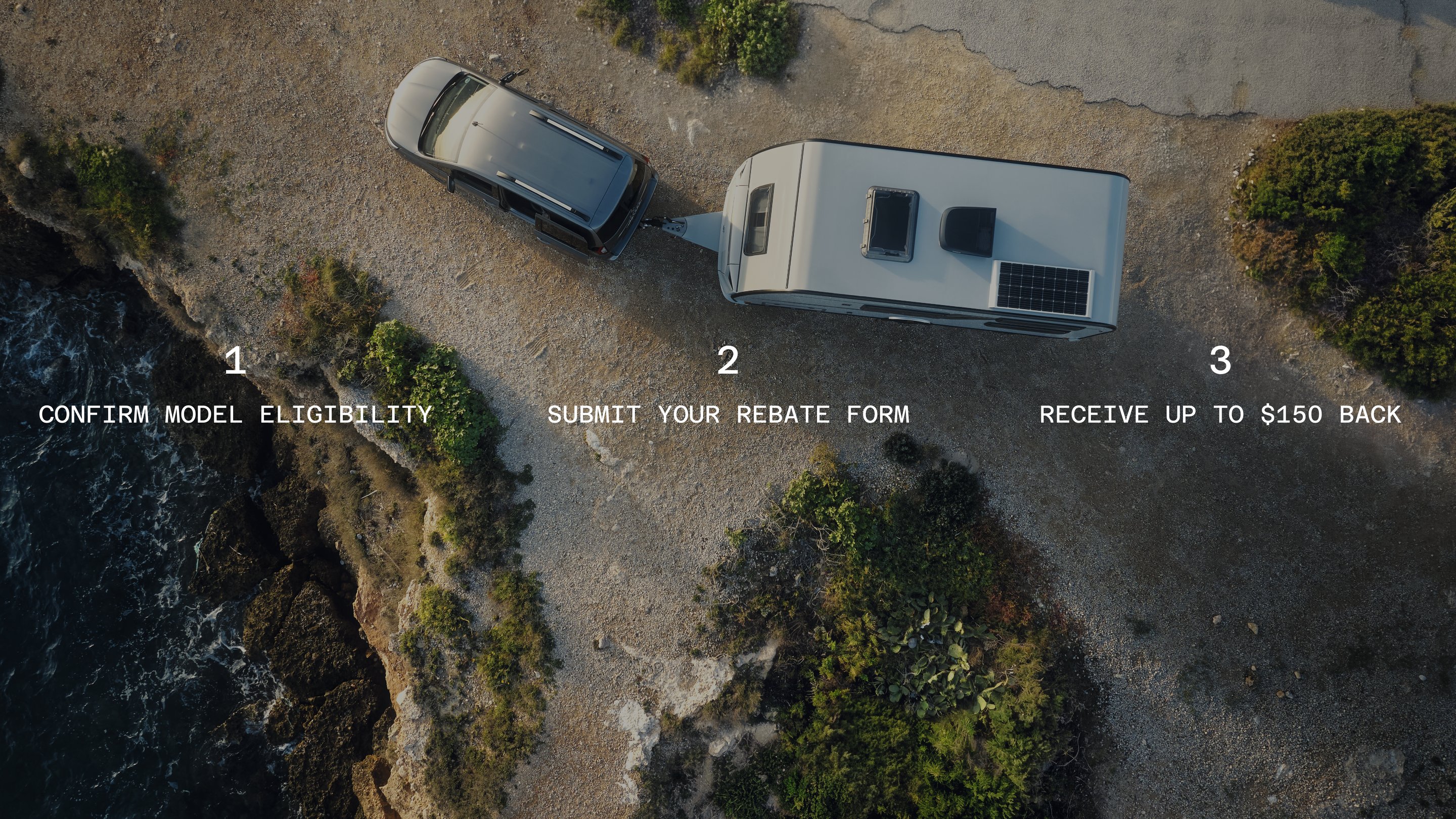 Aerial shot of truck towing RV off highway road. 1.Confirm model eligibility. 2.Submit your rebate form. 3. Receive up to $150 back.