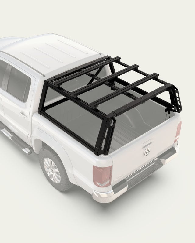 Pro Bed Rack mounted on a pickup truck bed, modular cargo rack system designed for carrying gear and accessories