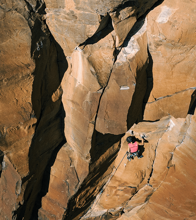 Woman rock climbing