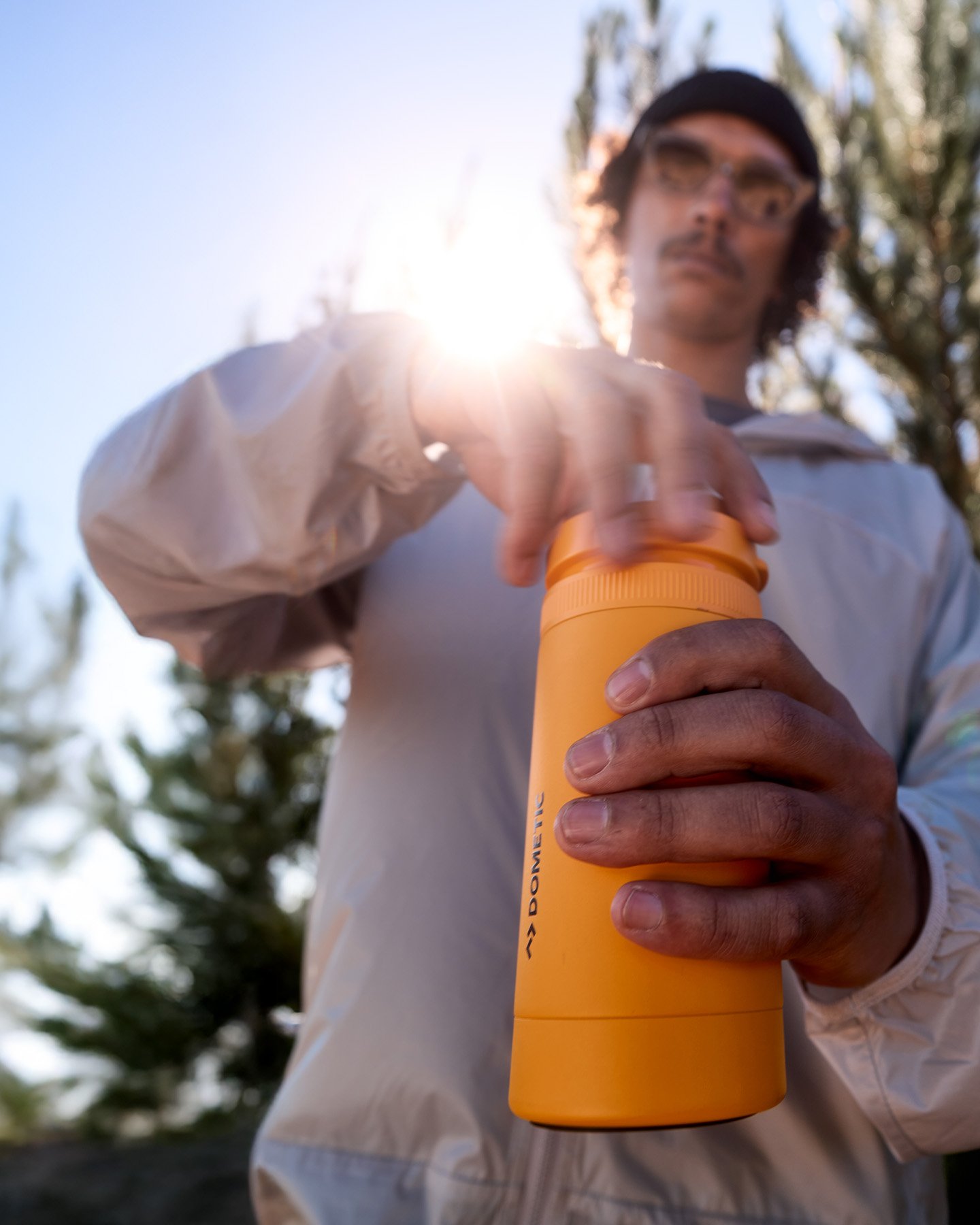 man with recon cup yellow