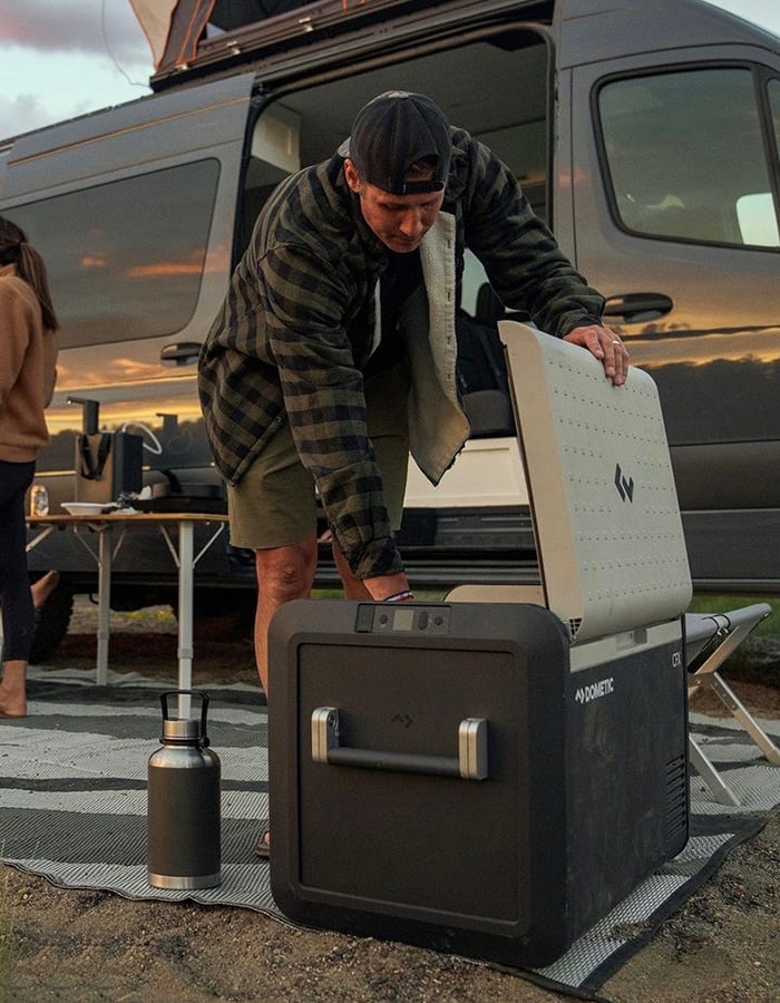 Colton Jacobs using Dometci CFX3 cooler on a camping trip