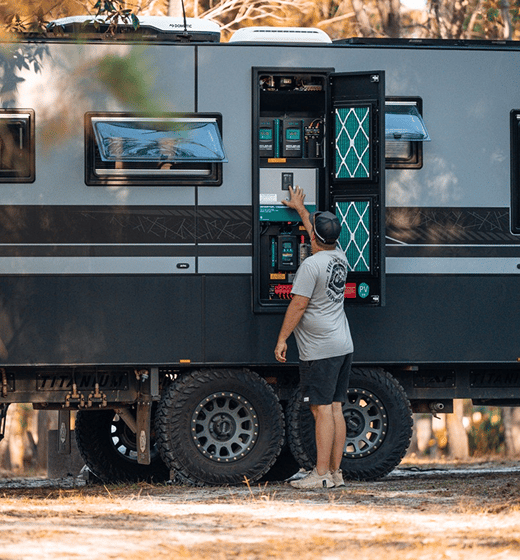 Stacked Enerdrive lithium batteries inbuilt into RV walls with an outside access door powering your off grid dreams