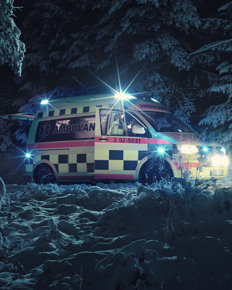 Emergency vehicle at night in forest
