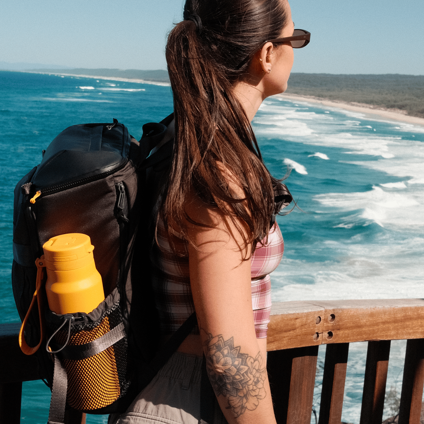 Breanna Hurst carries her trusty Dometic Unrestricted backpack and Dometic Drinkware to go hiking on Stradbroke Islands most popular walking tracks