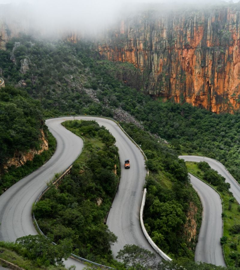Drone image of vehicle on winding path