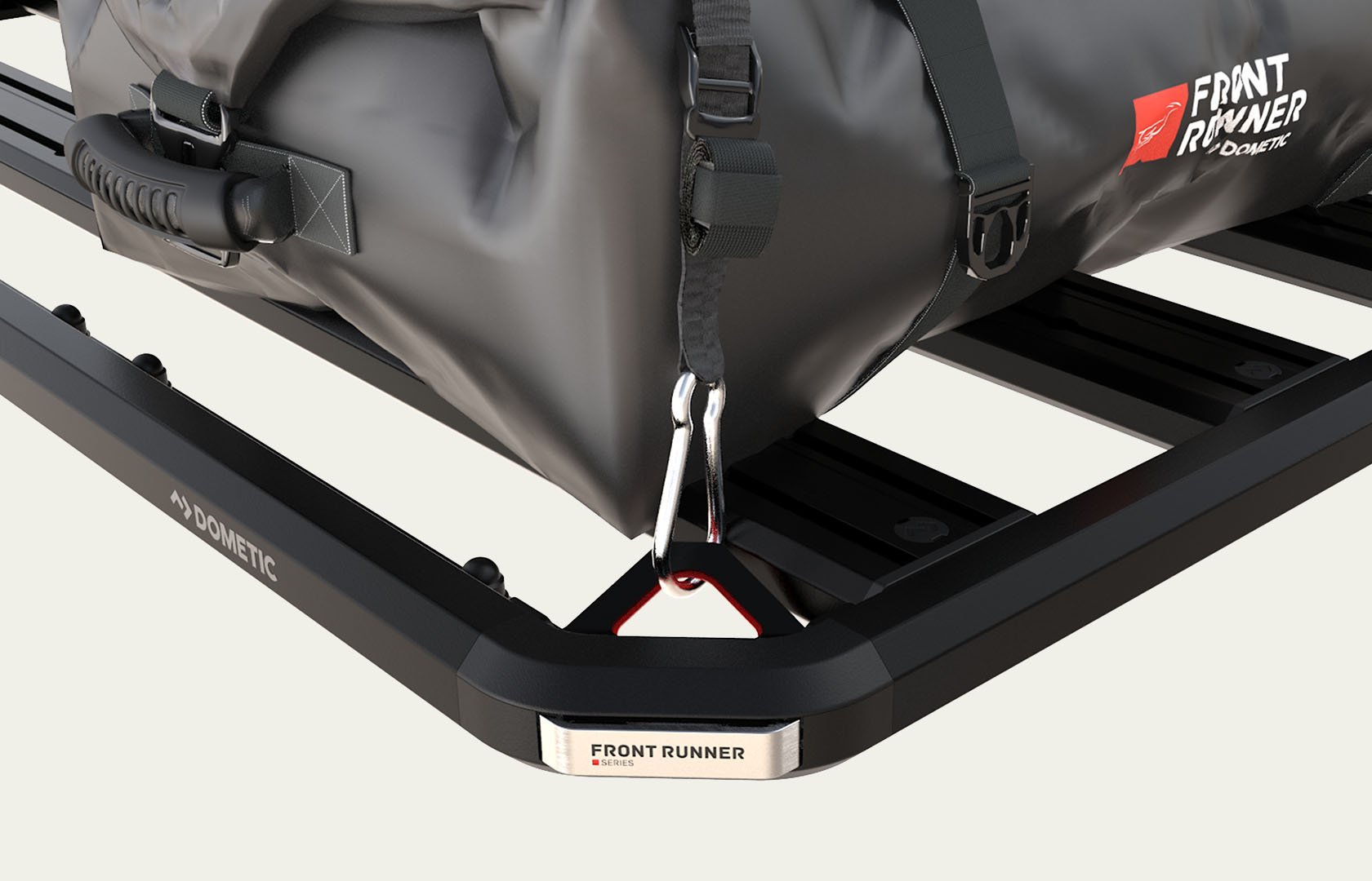 Dometic Front Runner Series Slimline 3 roof rack with integrated tie-down points securing a gear bag to the modular cargo platform