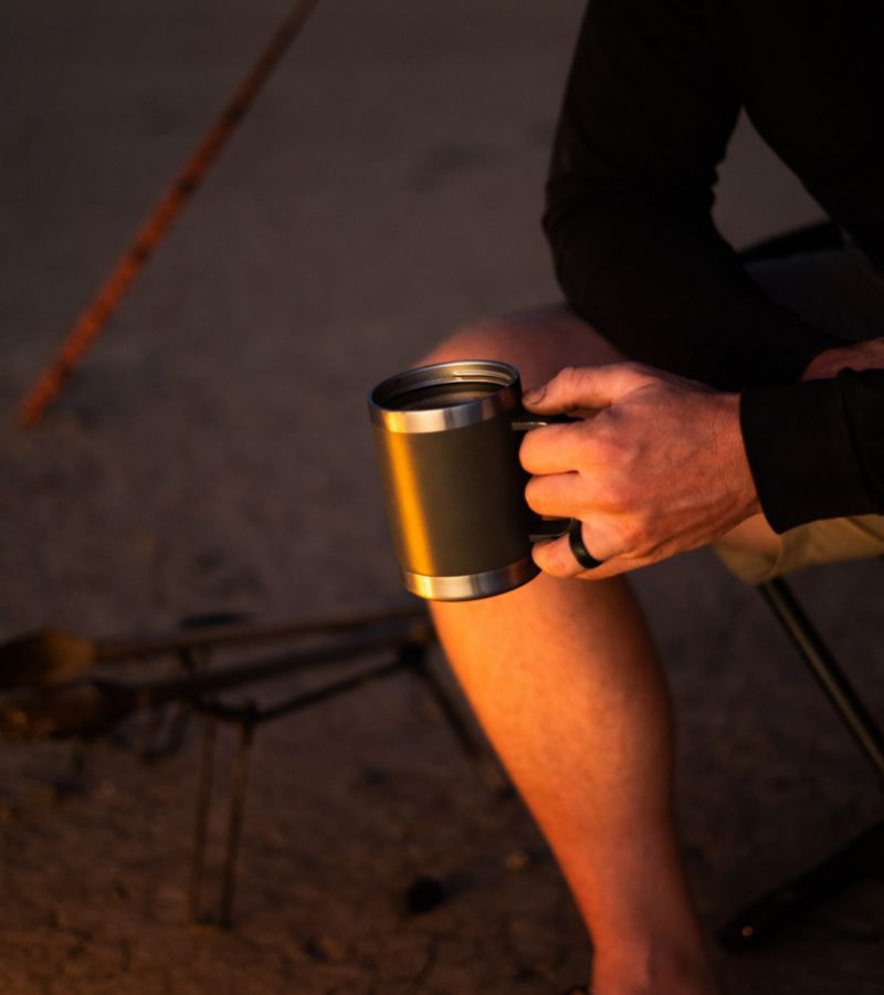 Product shot of person holding Dometic Mug