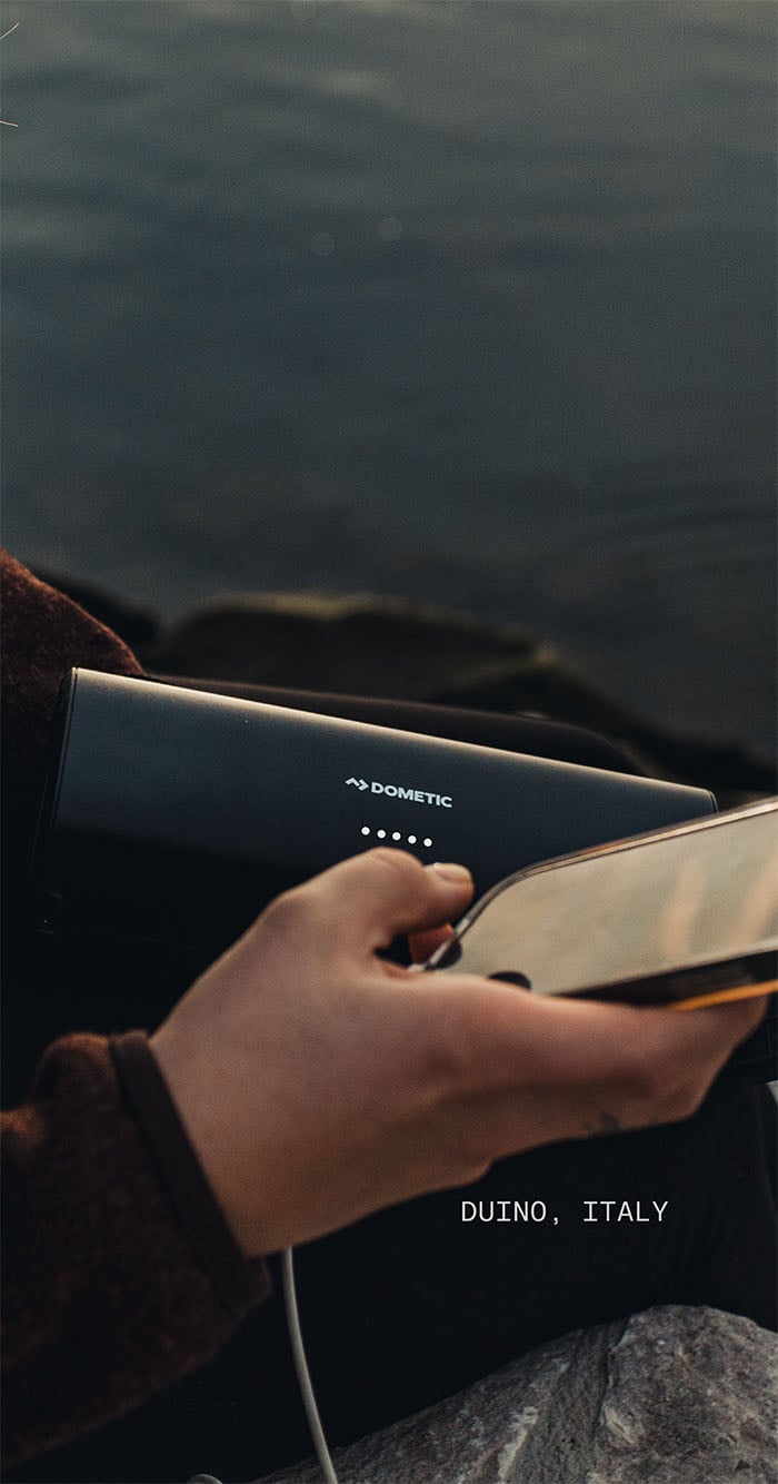 A Dometic PLB15 charging a phone