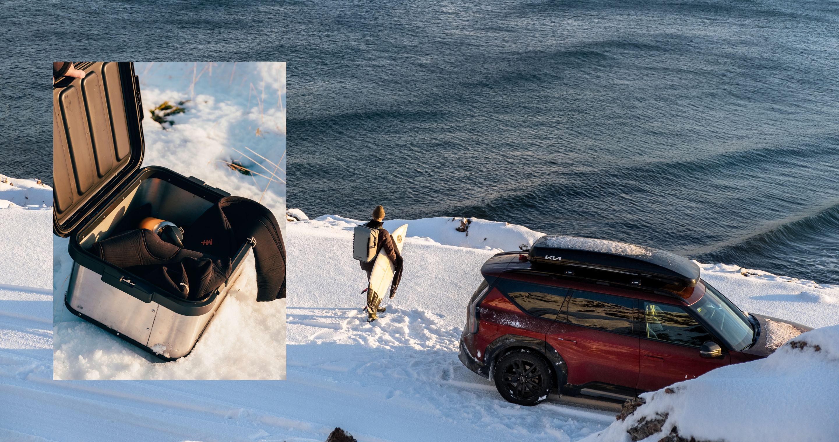 Hand holding open a Dometic Hard Storage on the snowy ground filled with a wetsuit and dometic drinkware.