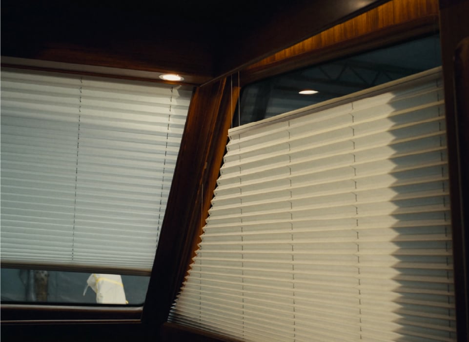 Interior view of boat windows with blinds