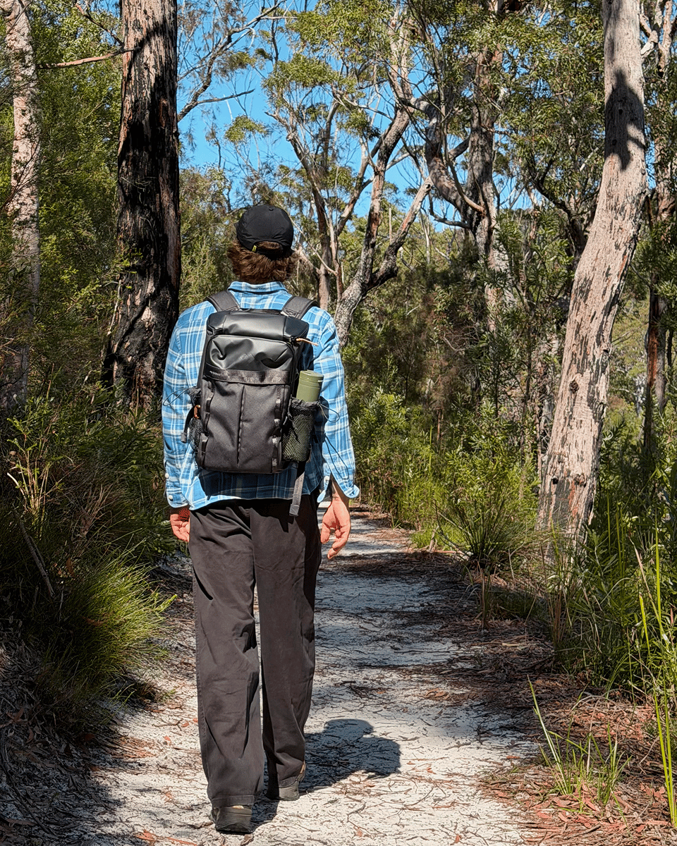 Harry heads off for a hike in North Stradbroke Island bush with his Dometic Unrestricted Backpack filled with cold drinks and snakes to have along the way.