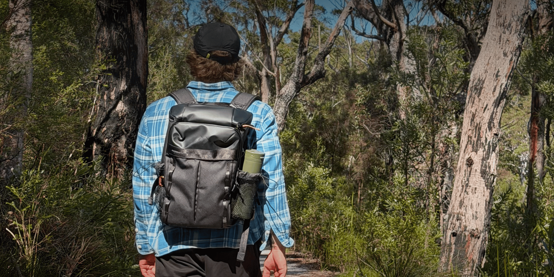 Harry explores the scenic bush trails of Stradbroke Island with his Dometic Unrestricted Backpack, packed with cold drinks and snacks. Designed for comfort and adventure, it's the perfect companion for hiking, day trips, and exploring the great outdoors.