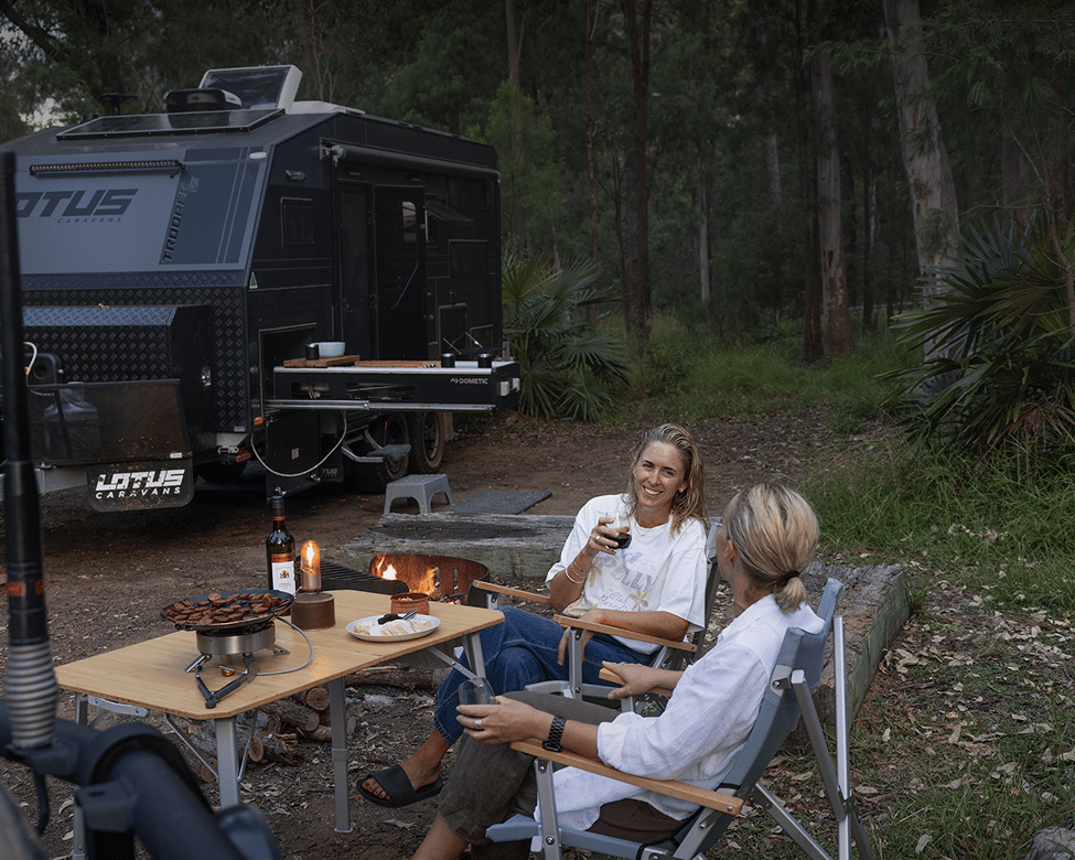 RV Dometic slide out kitchen and Go camp table and chairs set up for the night in the outback