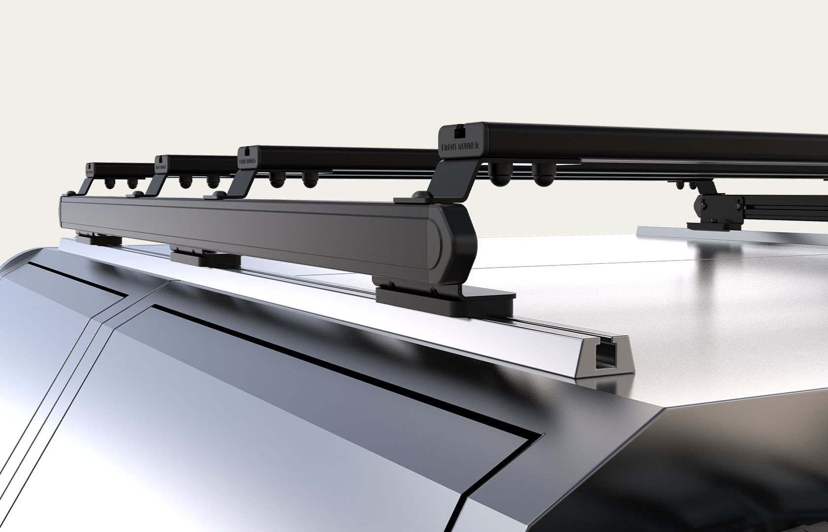 Front Runner Dometic Slimpro roof rack mounted using vehicle roof channels, low-profile installation system with no drilling required