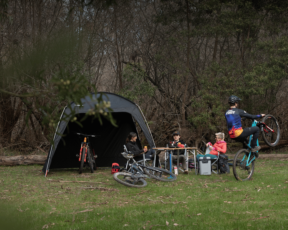 Base camp at the trail runs, mountain bikes shaded by the Go Camp Shelter lunch stop set up with the Camp table and chairs. Perfect life outdoors day.