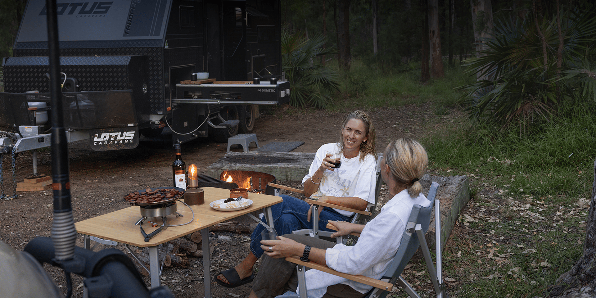 RV Dometic slide out kitchen and Go camp table and chairs set up for the night in the outback