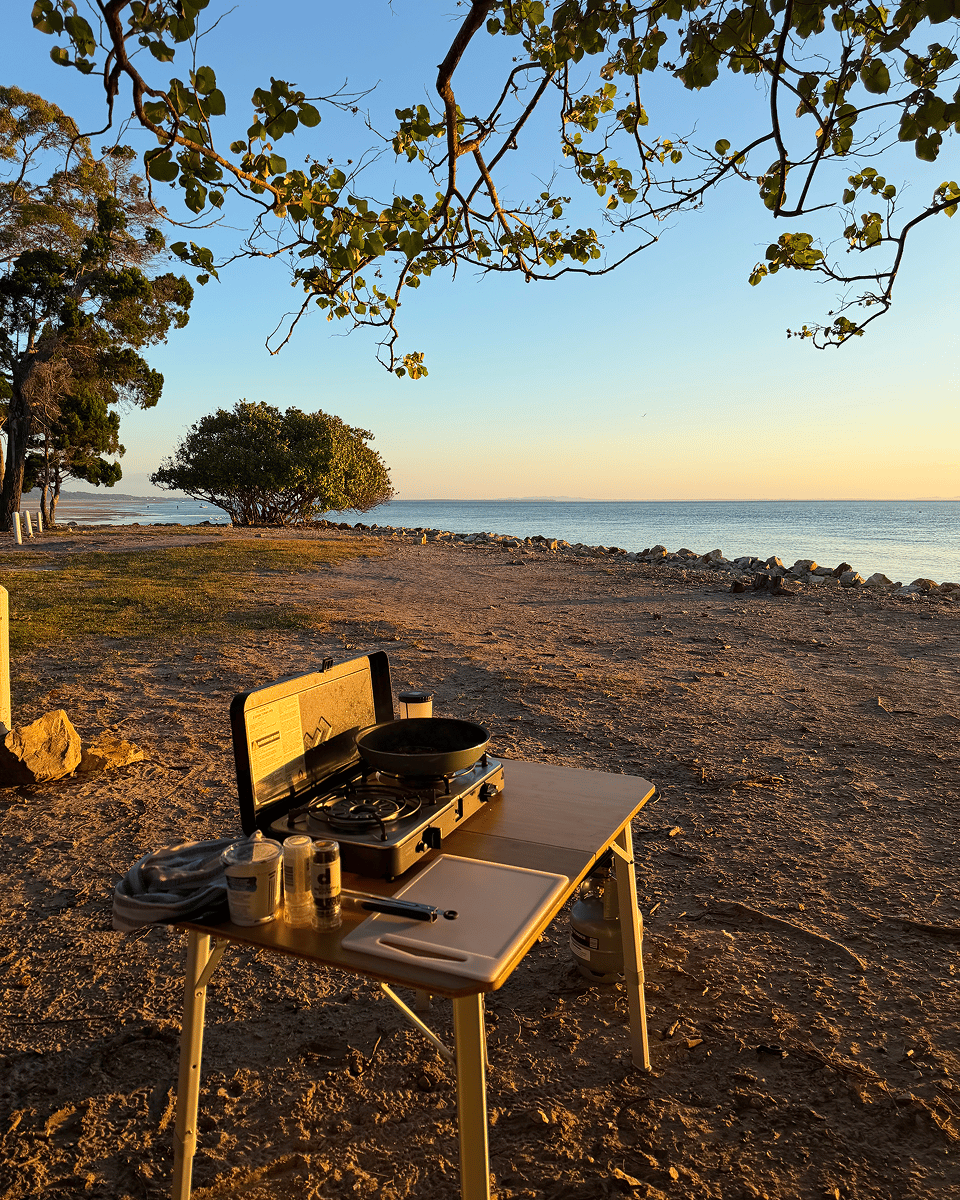Harry embraced the relaxed camping lifestyle, preparing a classic sausage and egg muffin on his Dometic 2 Cook Turbo stove. Enjoying breakfast in the fresh air, it was the perfect start to another day of adventure and life outdoors.