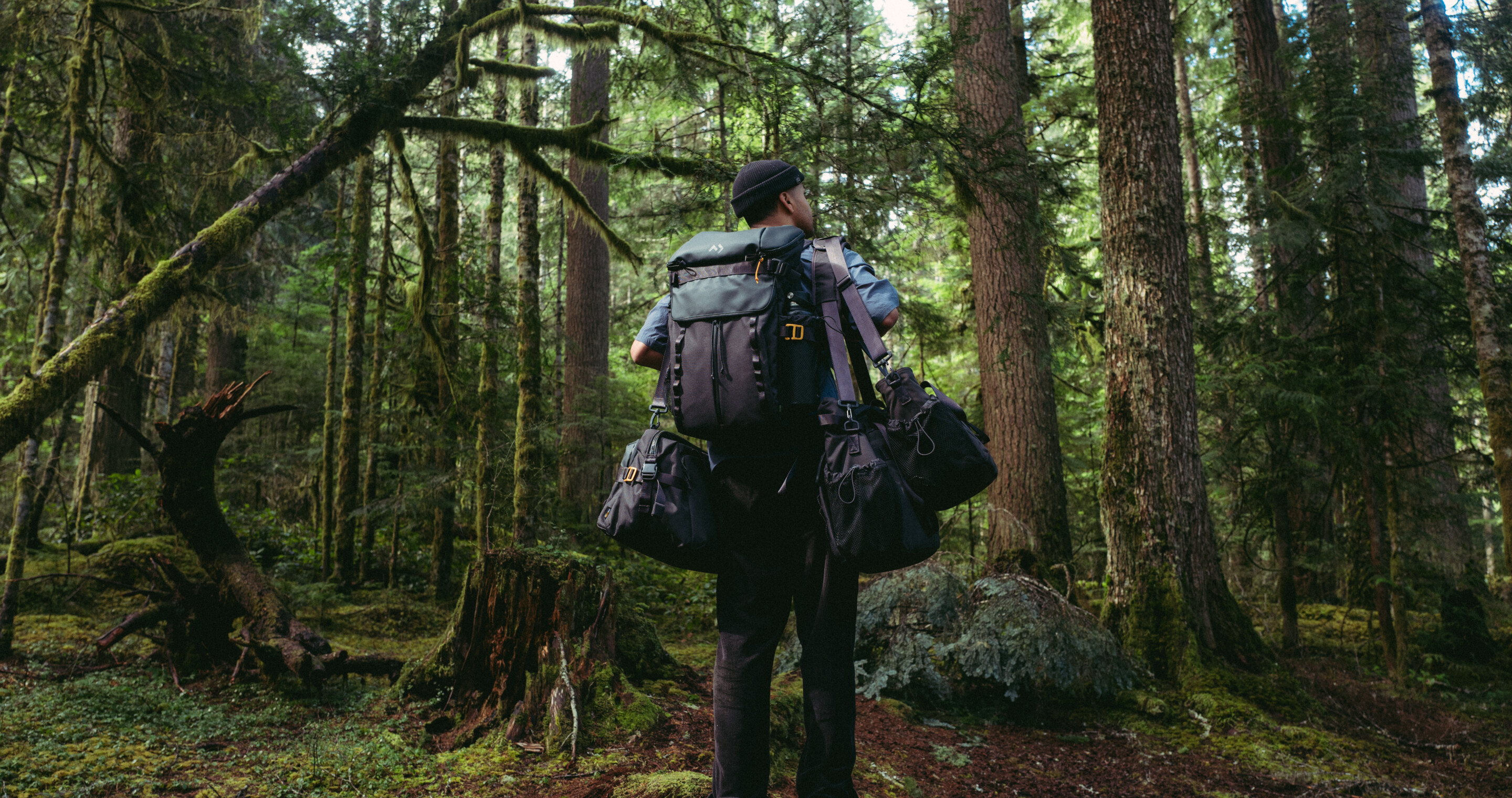 man with carrying bags in outdoors.