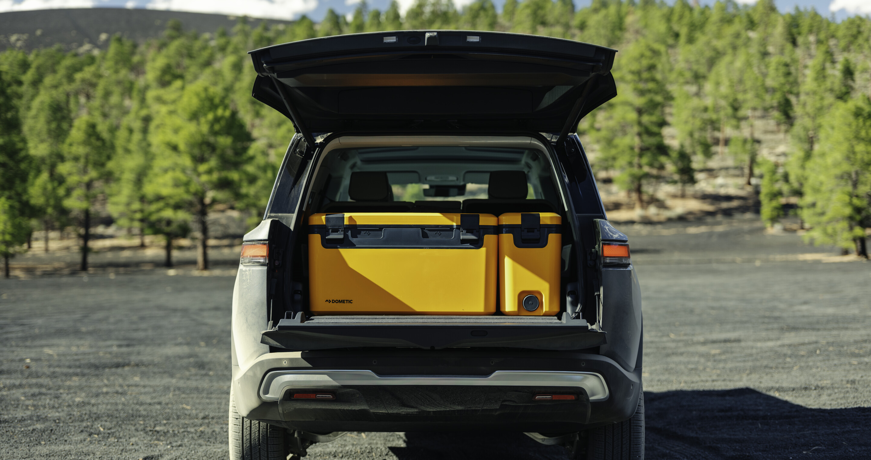 Back of car, packed with coolers.