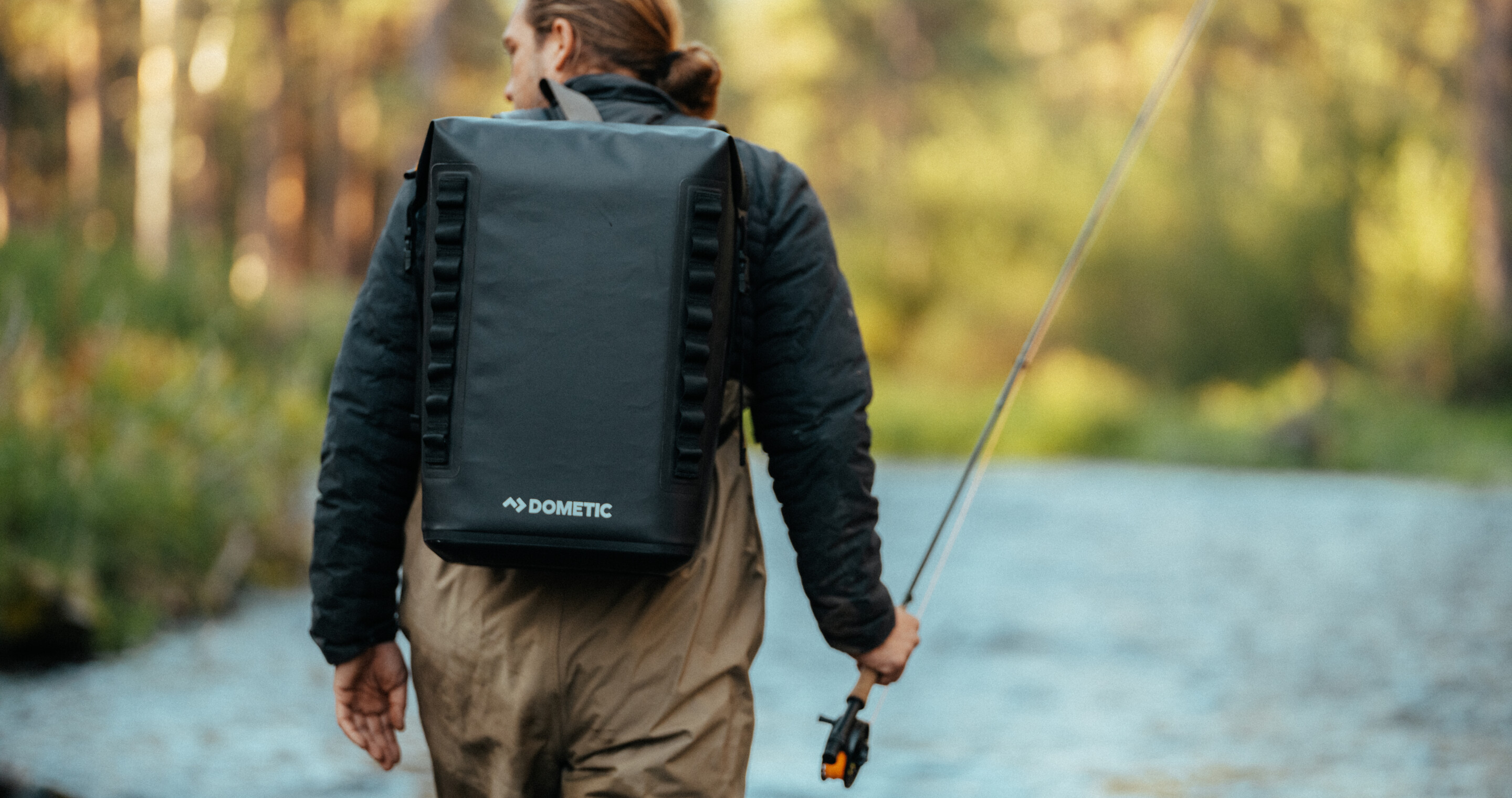Man fishing with the dometic PSC soft cooler.