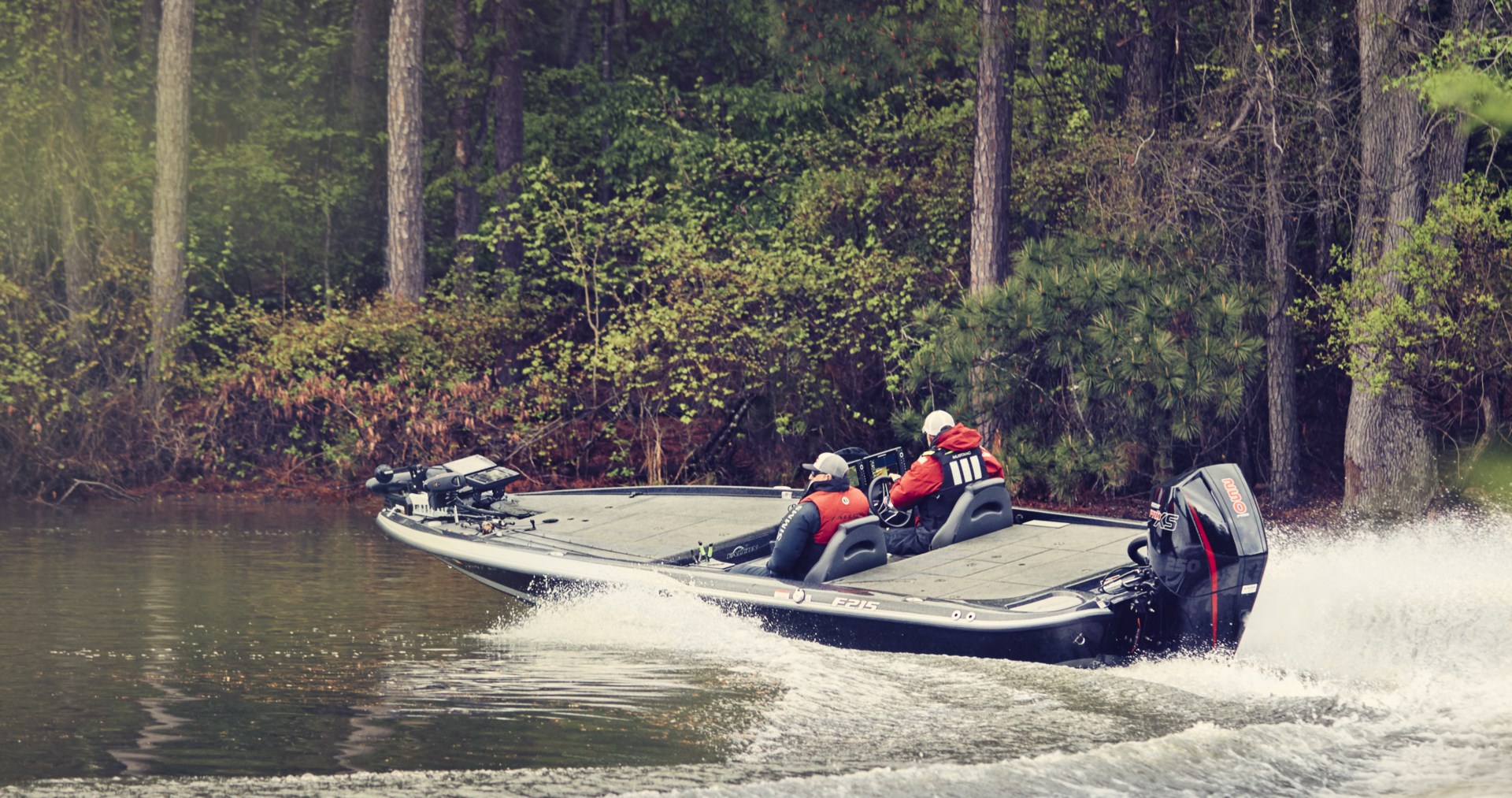 Boat equipped with SeaStar Jackplates driving on water